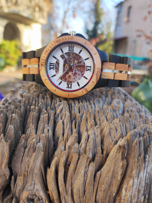 Clock in Ebony and Olive Wood.