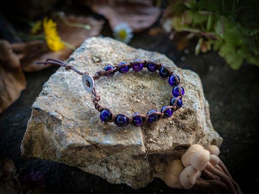 Bracciale in pietra intrecciato occhio di gatto viola